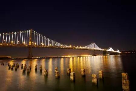 The Bay Bridge at night, showcasing the Bay Lights installation by artist Leo Villareal.